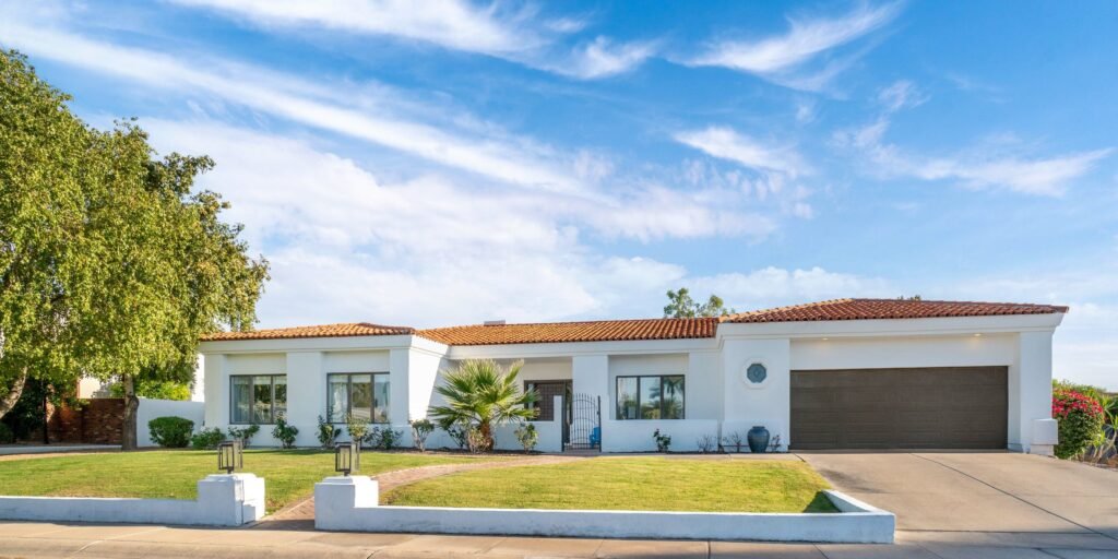 Maintained Landscaping with Elegant Entrance